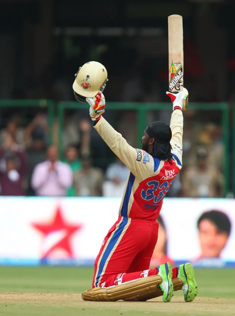 Chris Gayle acknowledges the applause after scoring the fastest century in history